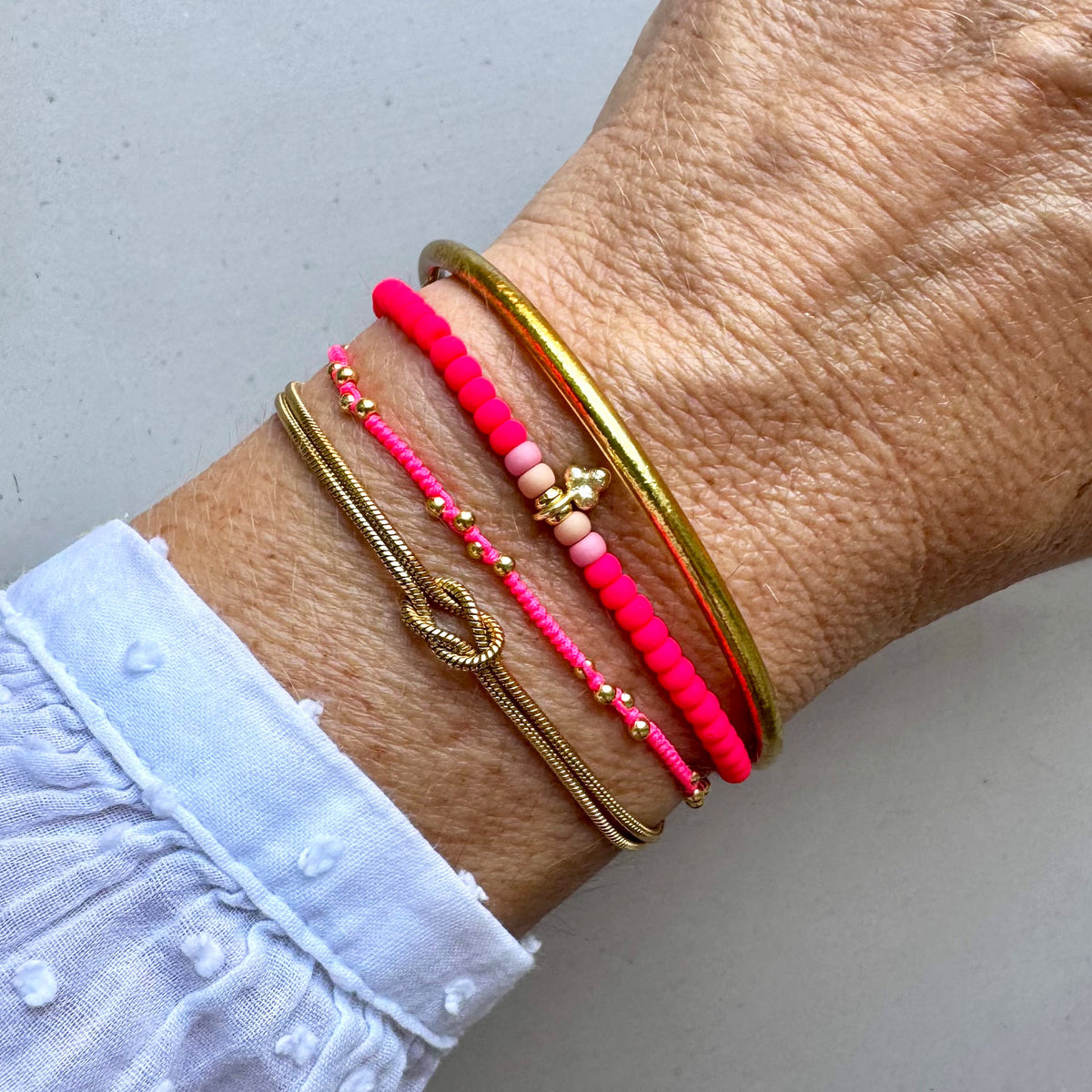 Feines Fadenarmband Pink Dots