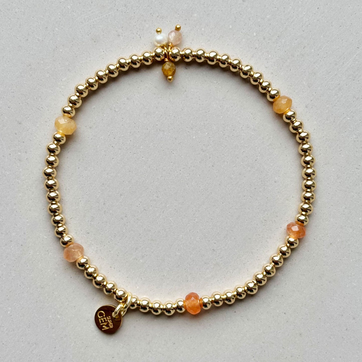 GOLDEN DOTS ORANGE CHARMS
