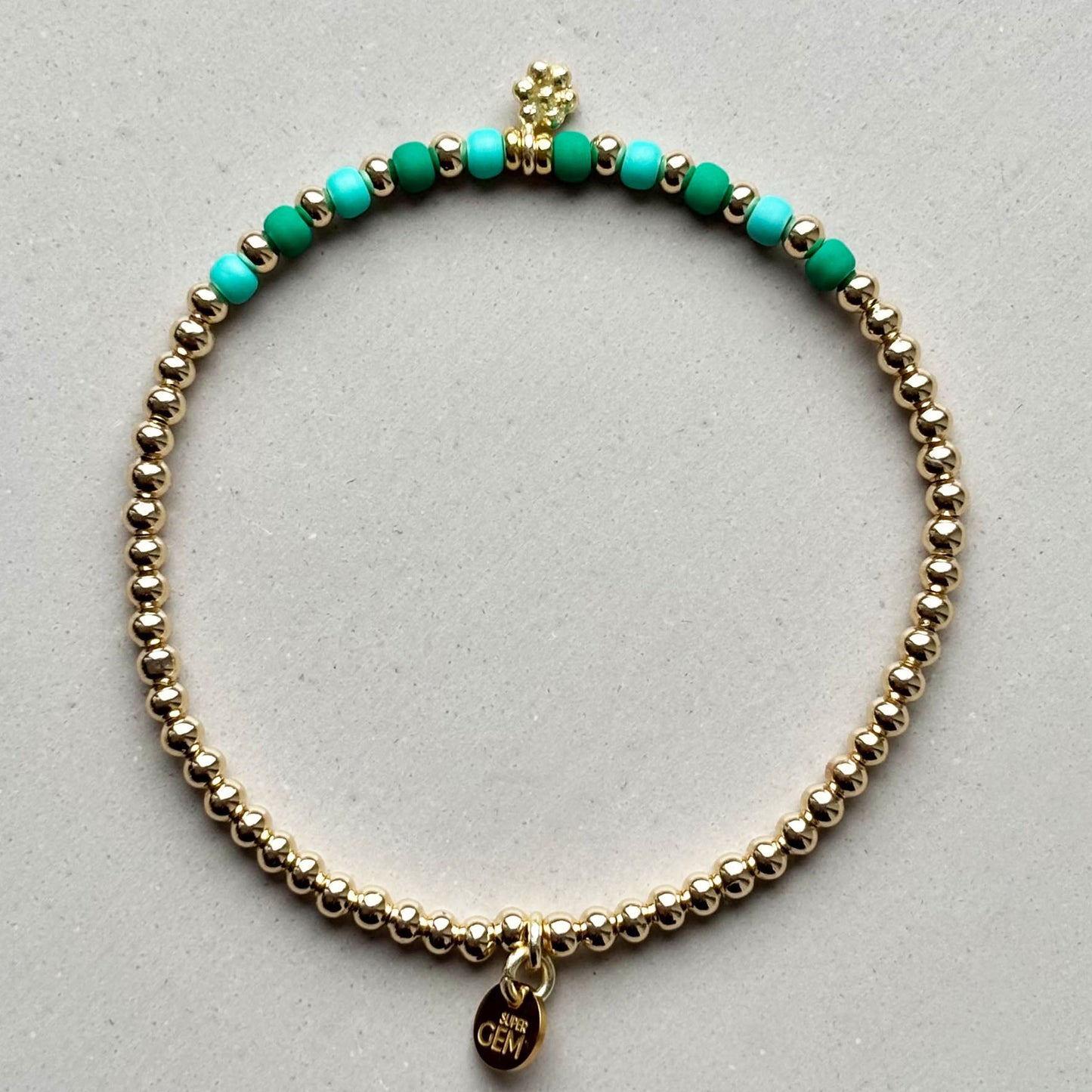 GOLDEN DOTS NEW PEACOCK