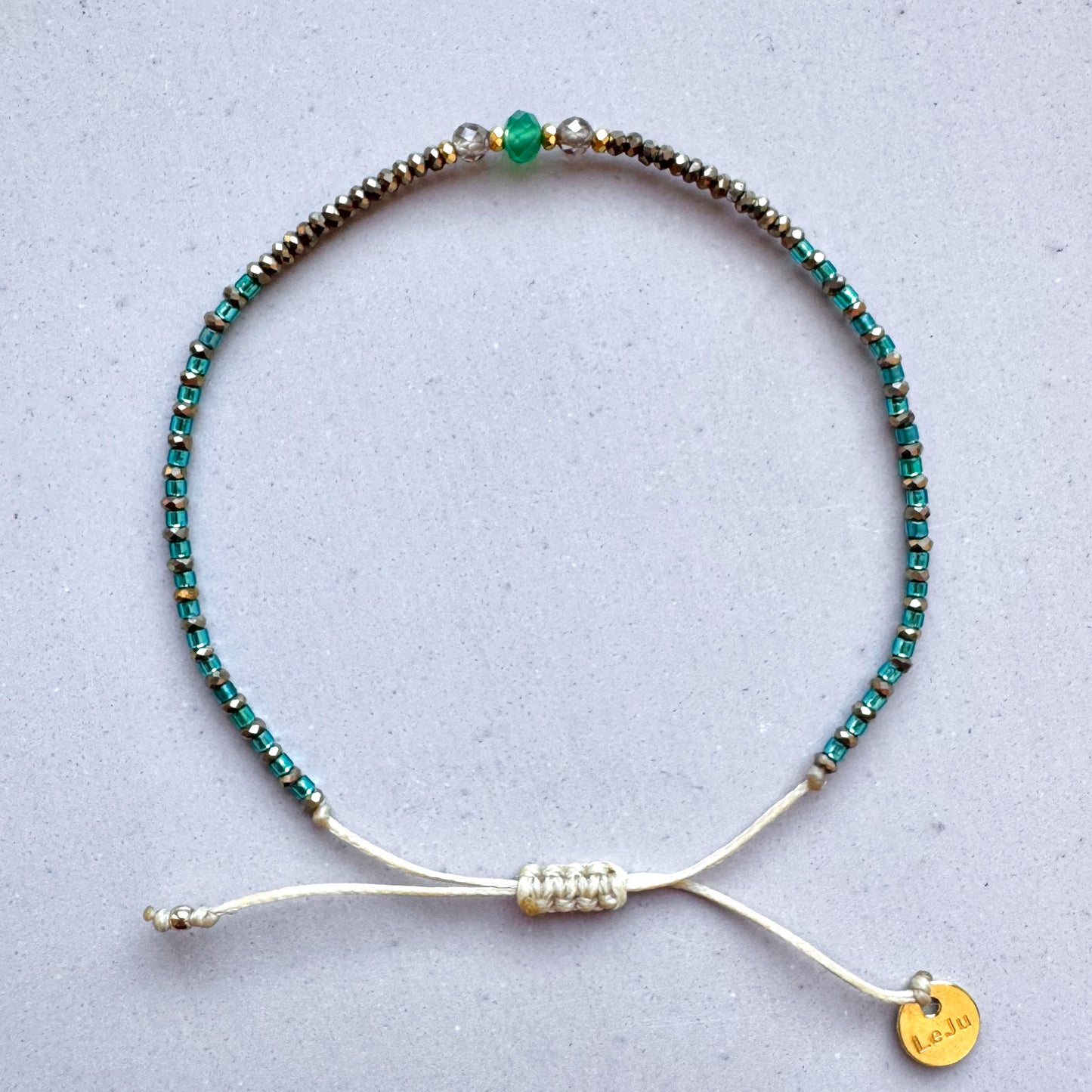 Fadenarmband Peacock